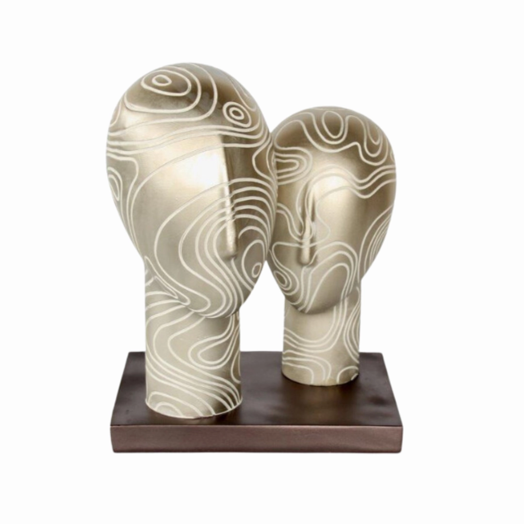 2 Silver heads on stand