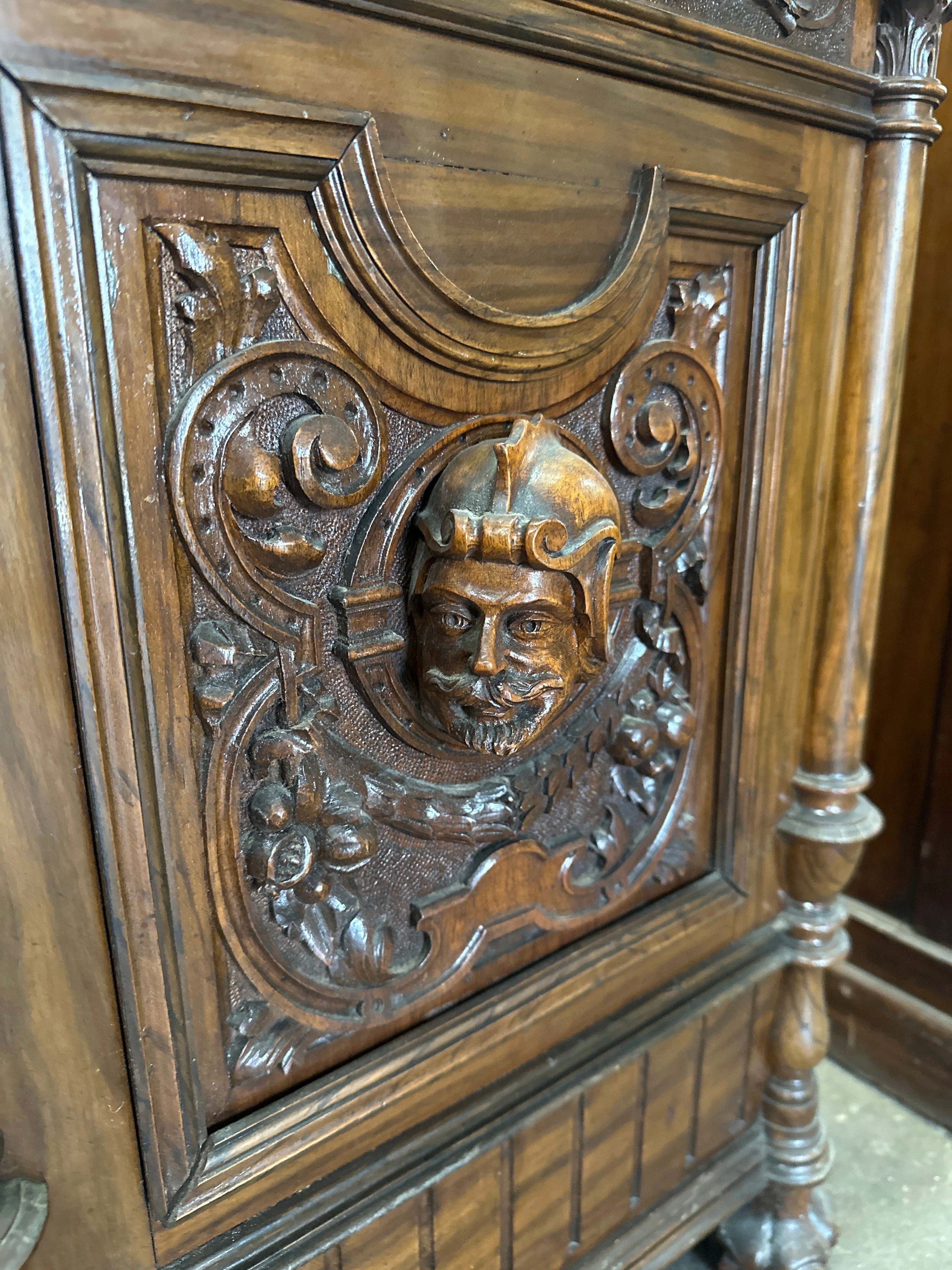 CARVED FRENCH WINE CABINET WITH FACES
