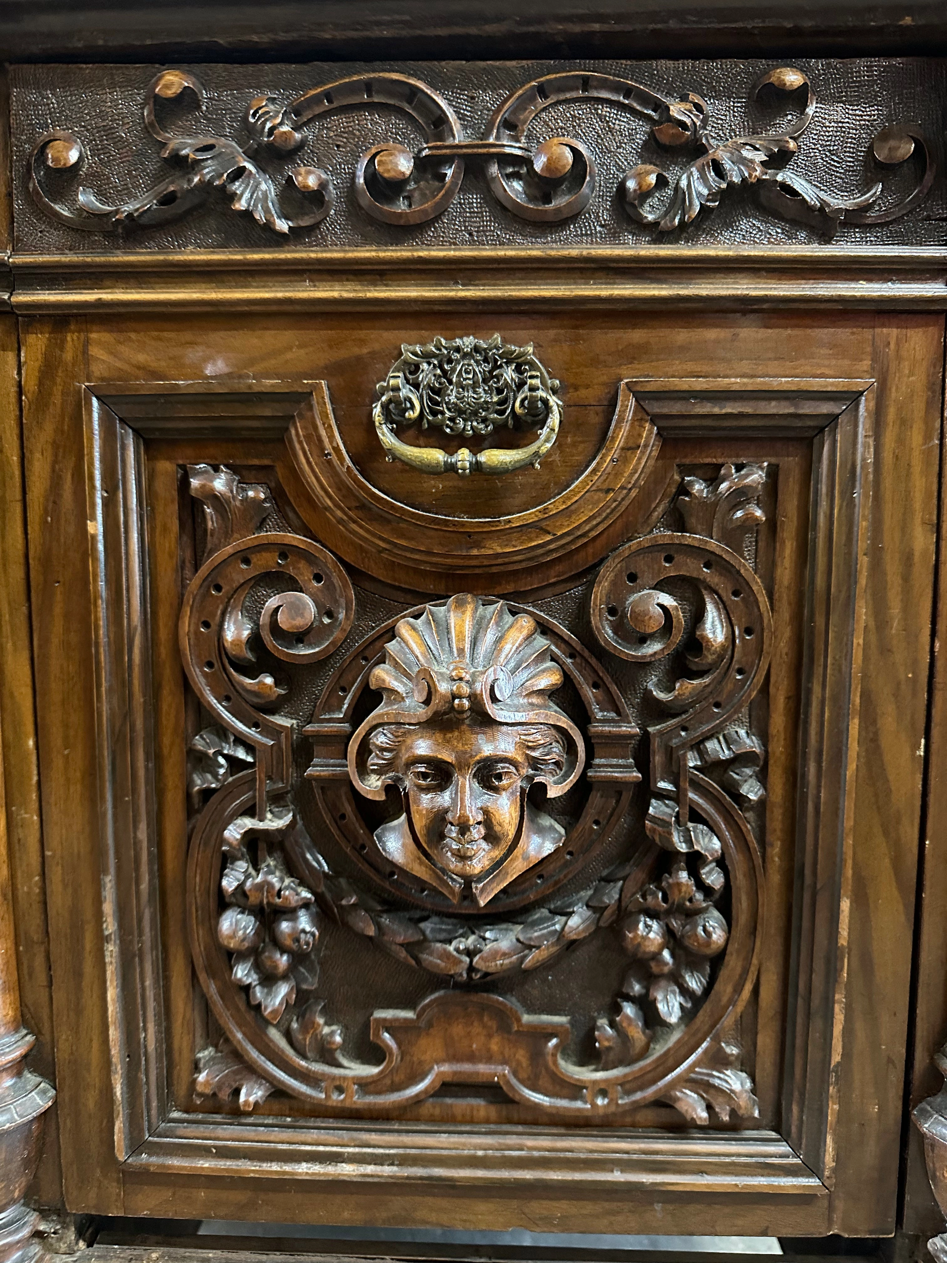 CARVED FRENCH WINE CABINET WITH FACES