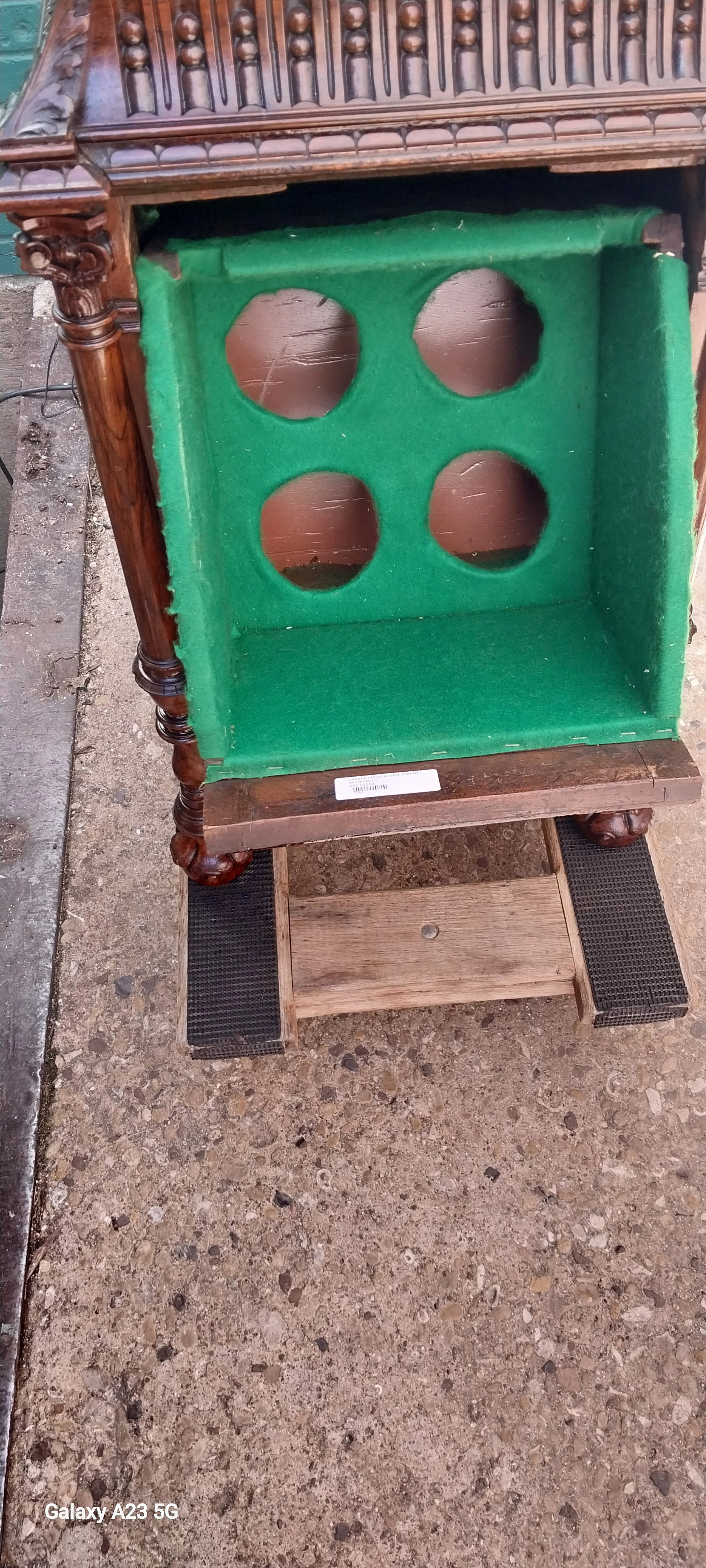 CARVED FRENCH WINE CABINET WITH FACES