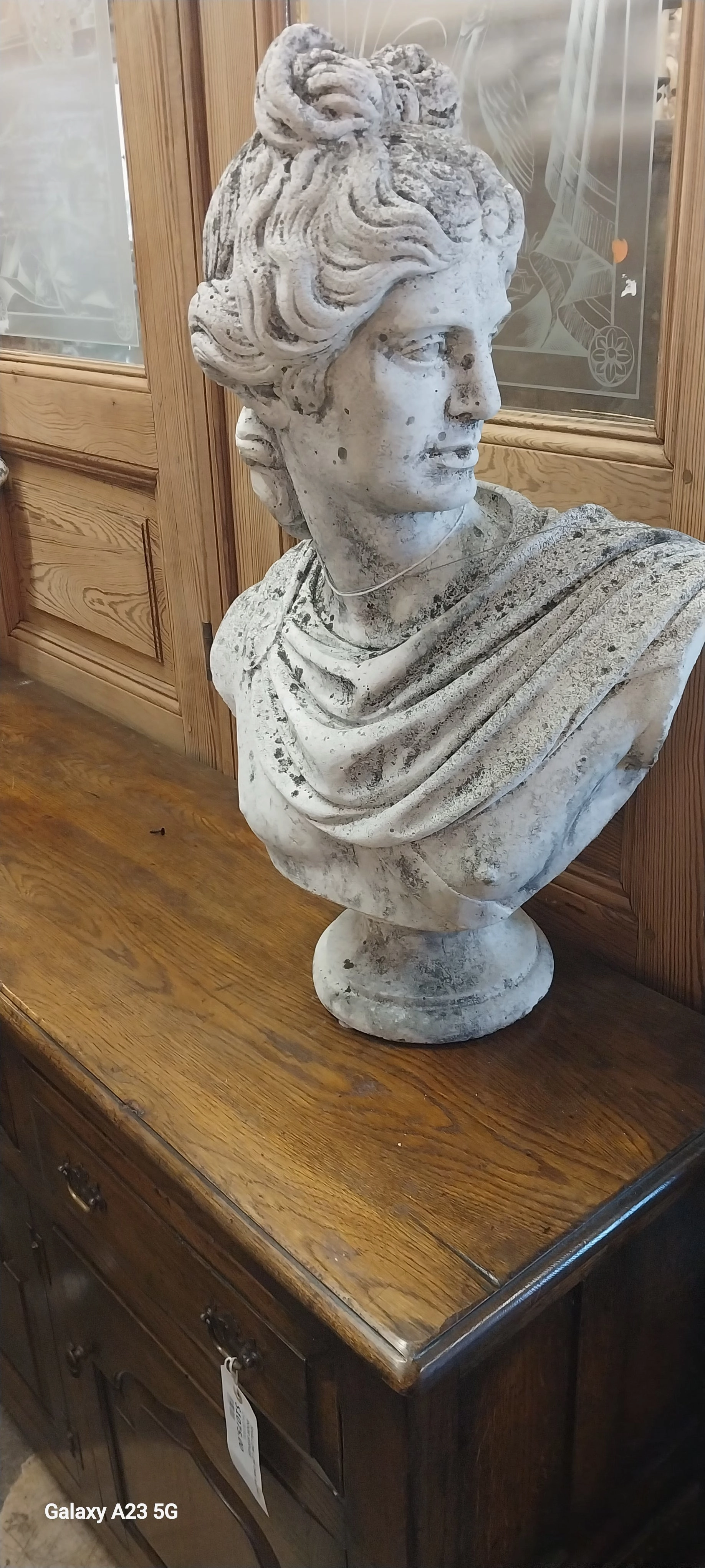 CONCRETE BUST OF A WOMAN