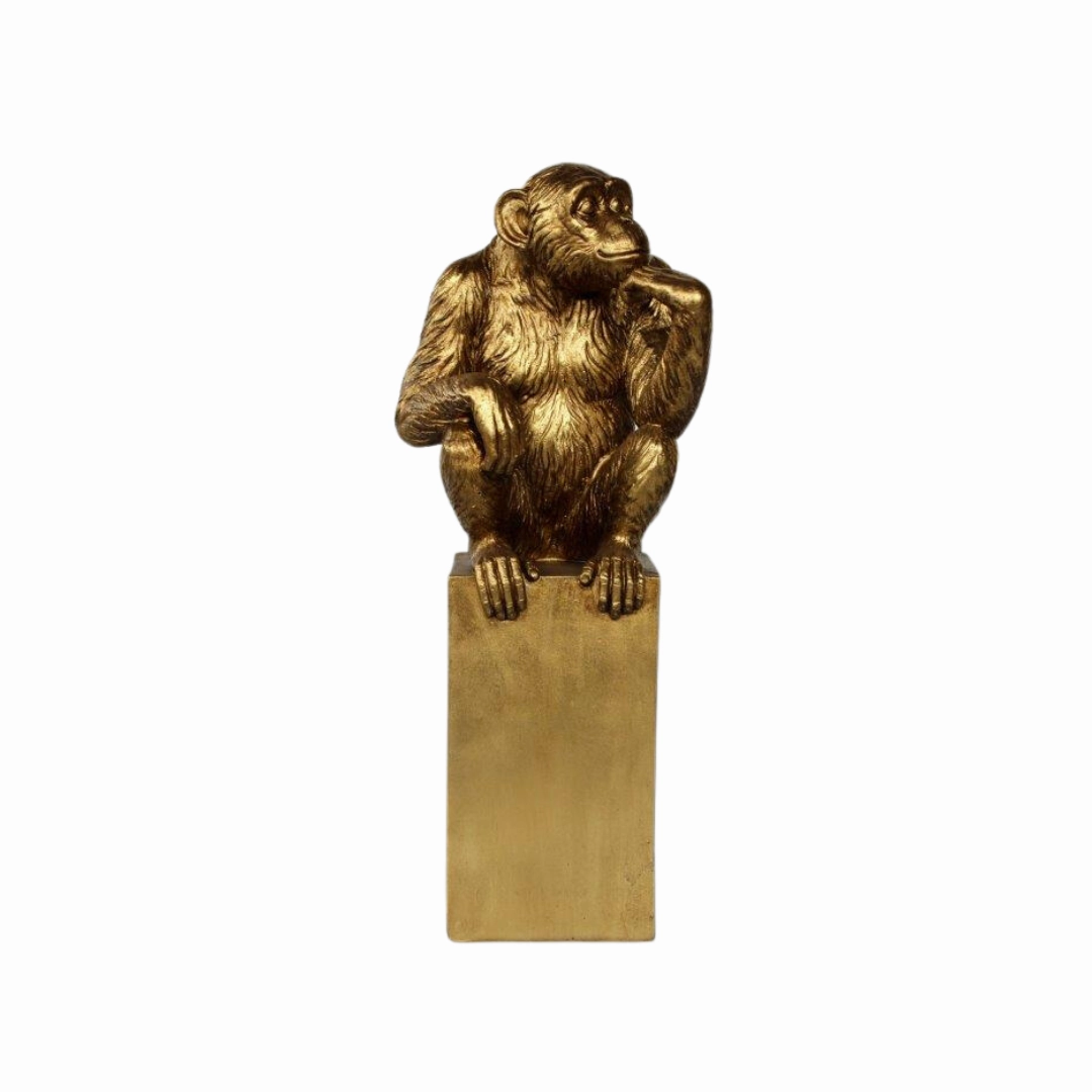 Gold monkey on base