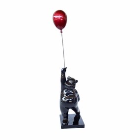 Large black bear holding red balloon decorative home ornament