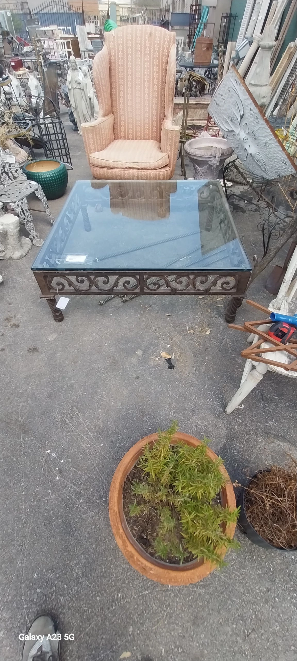LARGE IRON BASE COFFEE TABLE WITH THICK GLASS TOP