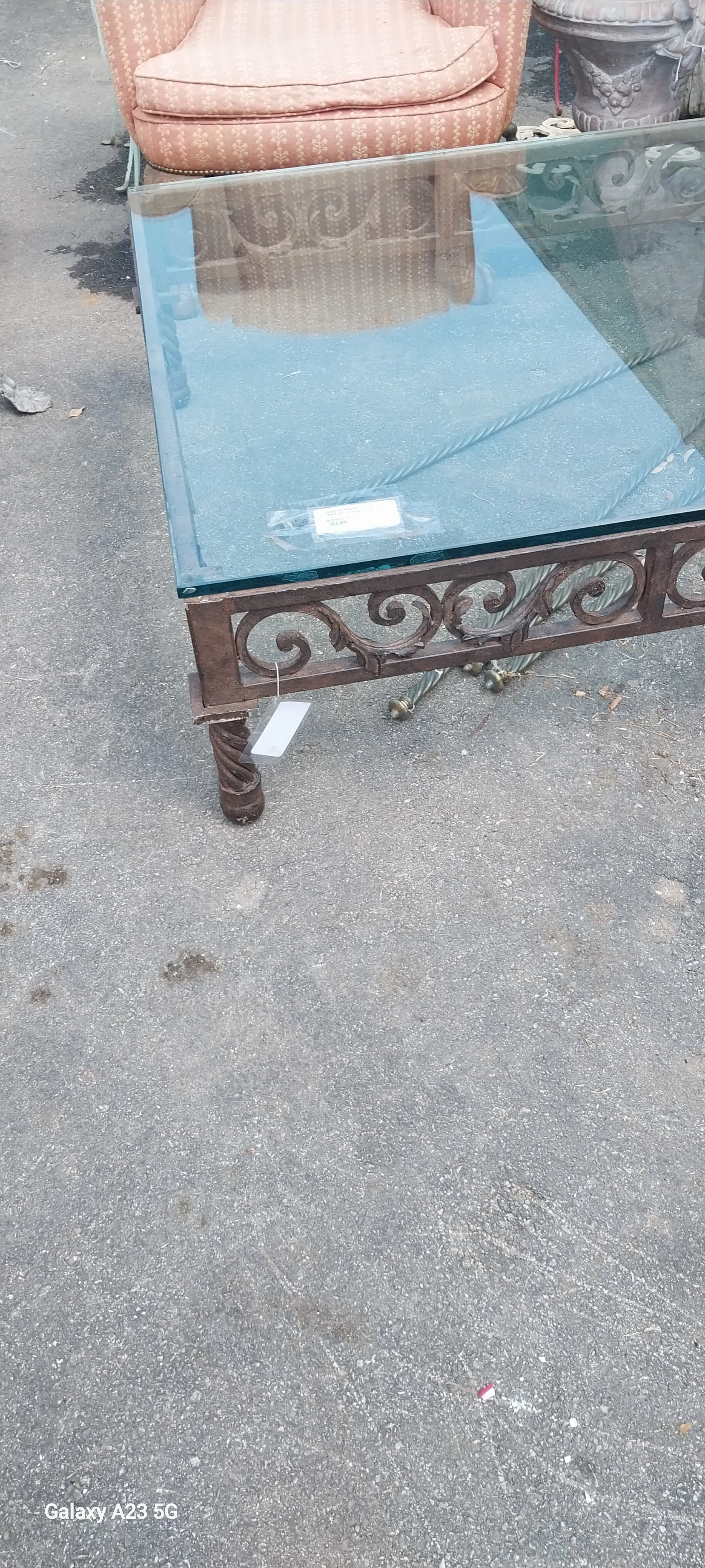 LARGE IRON BASE COFFEE TABLE WITH THICK GLASS TOP