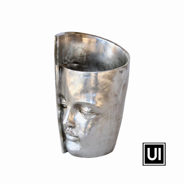 Large silver twisted face planter