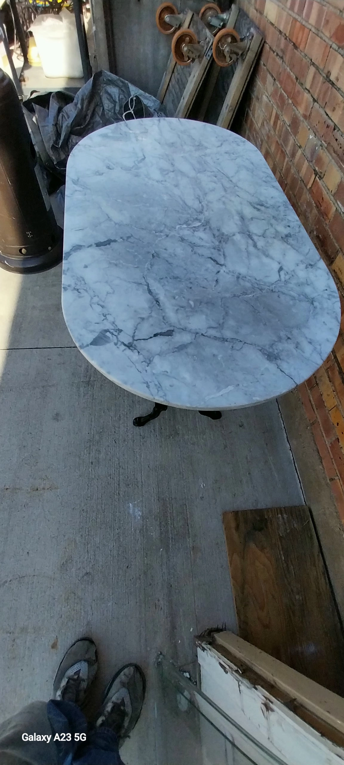 OVAL MARBLE TOP METAL BASE PUB TABLE