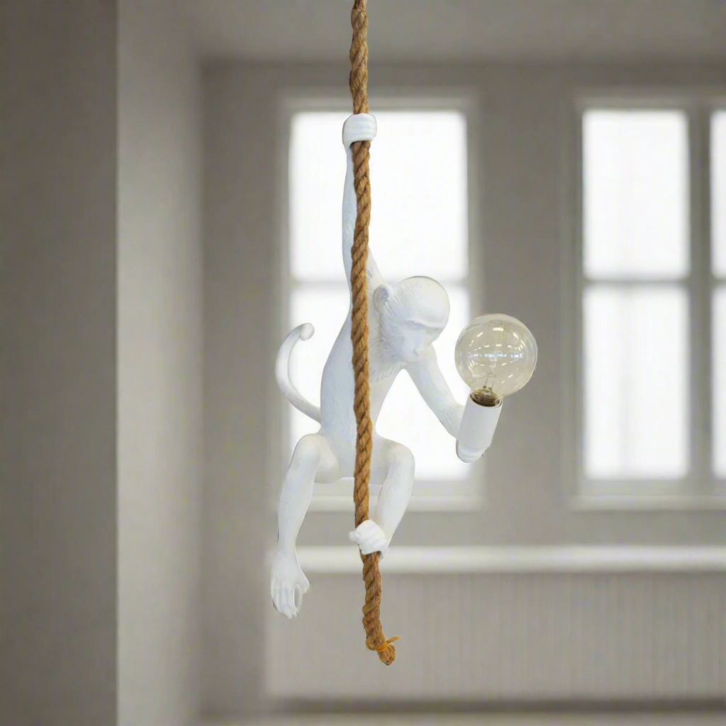 Resin monkey on rope white