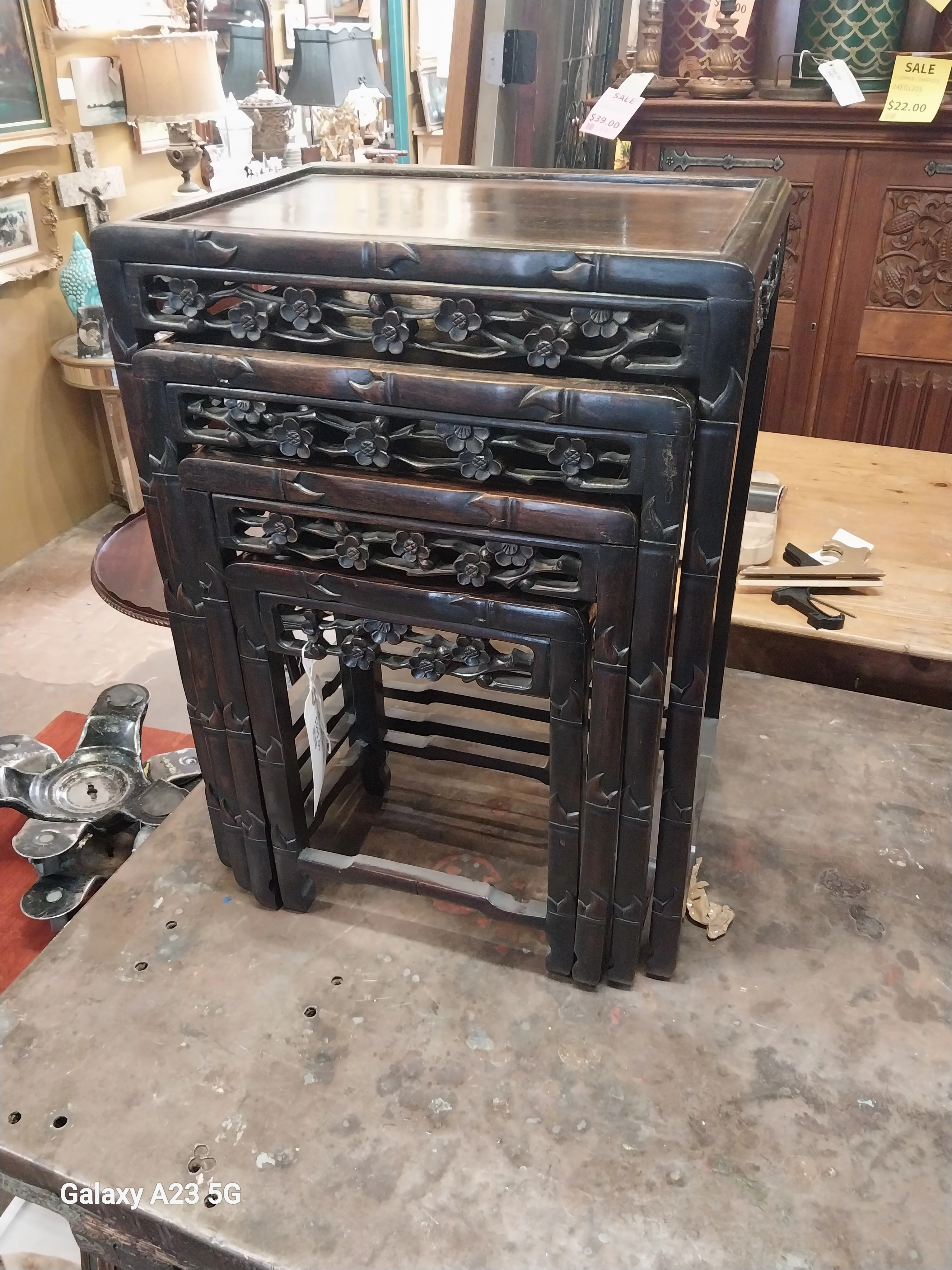 SET OF 4 FLORAL CARVED CHINESE NESTING TABLES