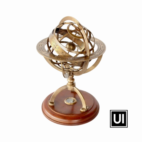 Small brass armillary star sign and compass