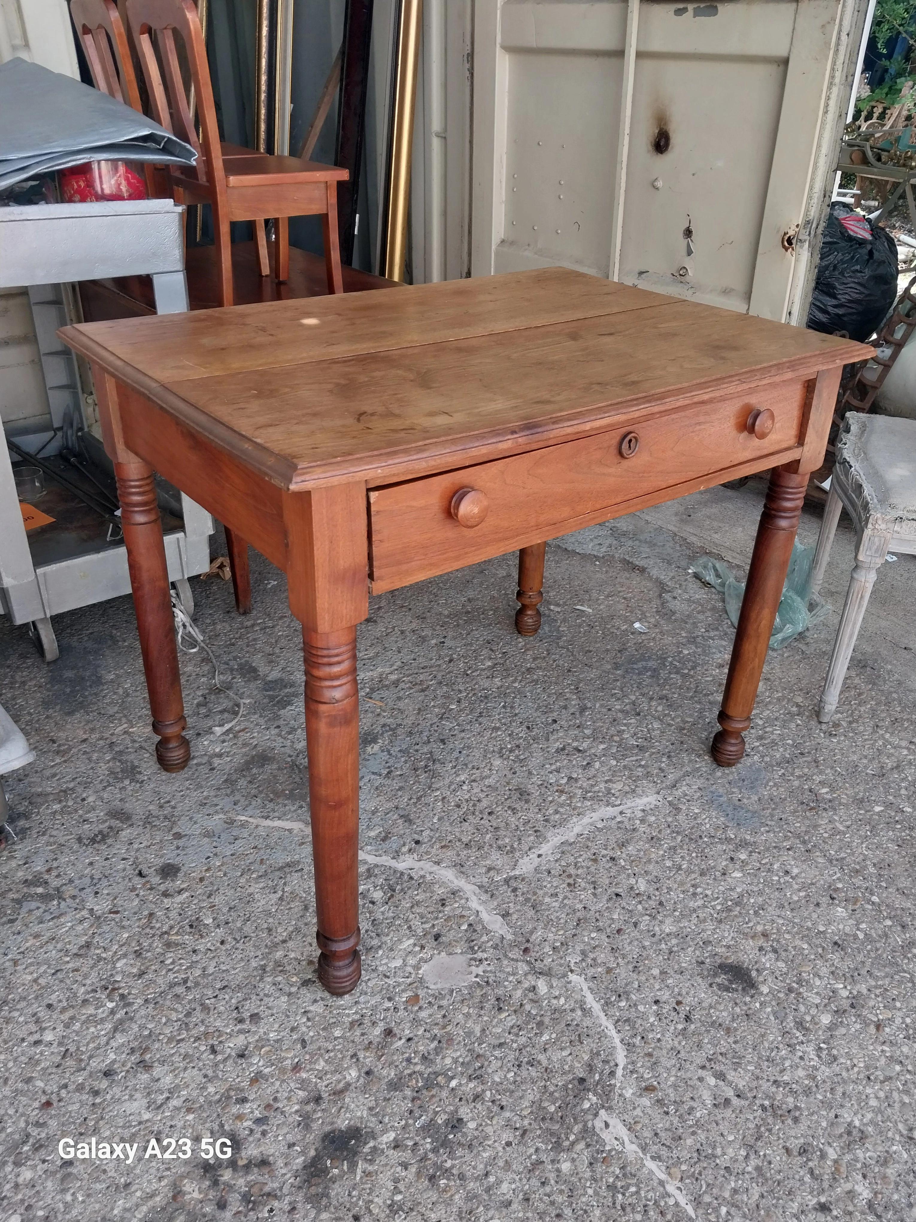 TURNED LEG AMERICAN WALNUT WRITING TABLE