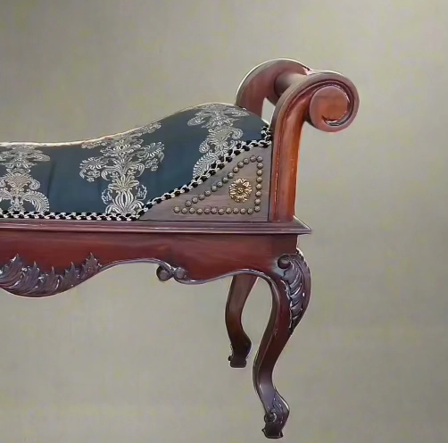 UPHOLSTERED CARVED MAHOGANY BENCH WITH ROLLED ARMS-NOT OLD